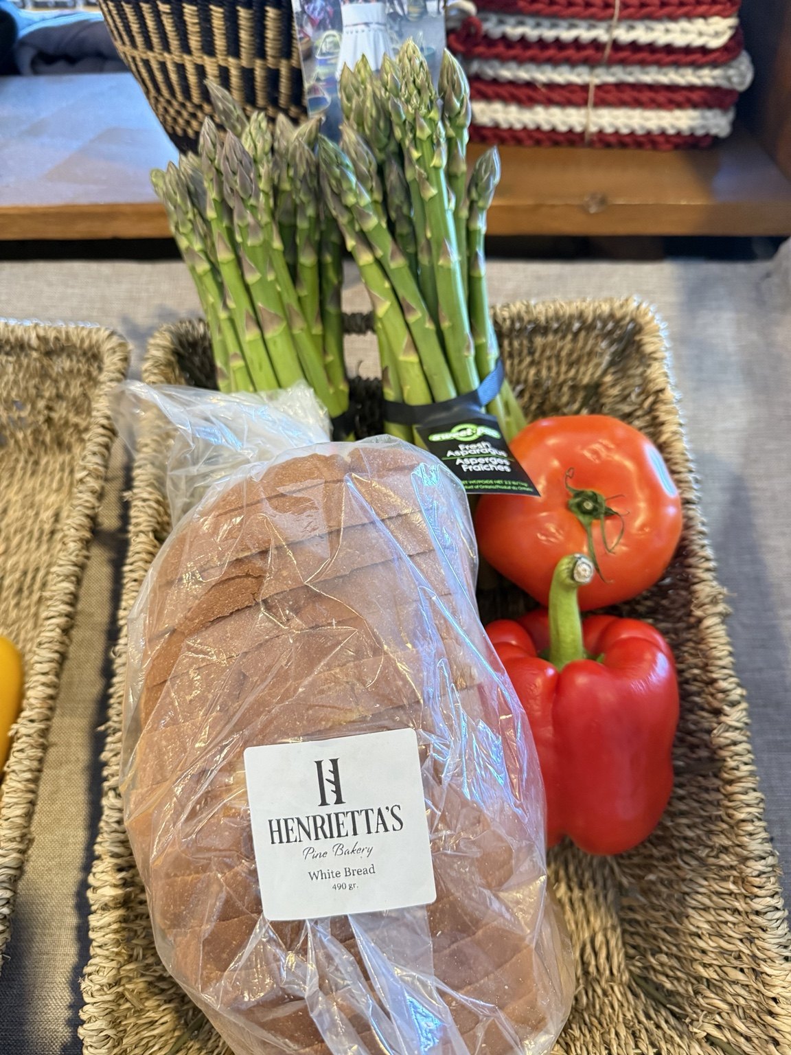 A Henrietta’s loaf displayed with fresh vegetables