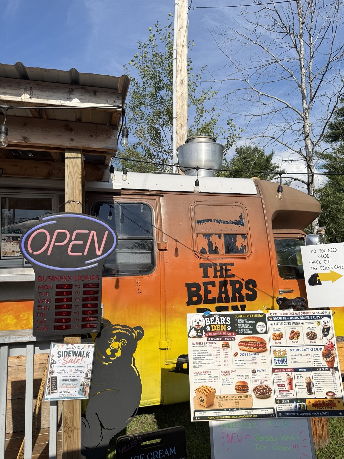 The orange and yellow Bear’s Den chip truck